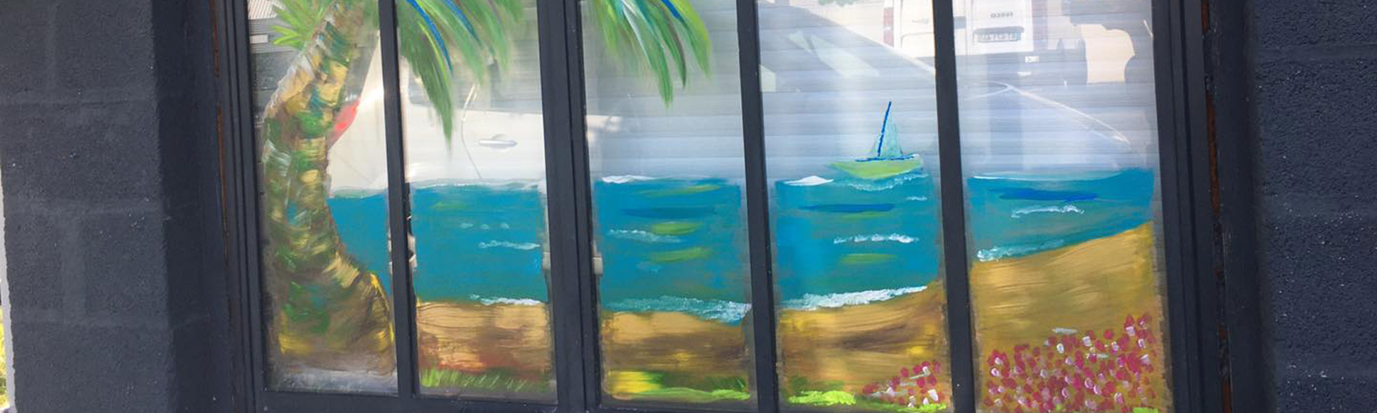 Peinture sur vitrine estivale pour la biscuiterie la dunkerquoise en cet été 2020